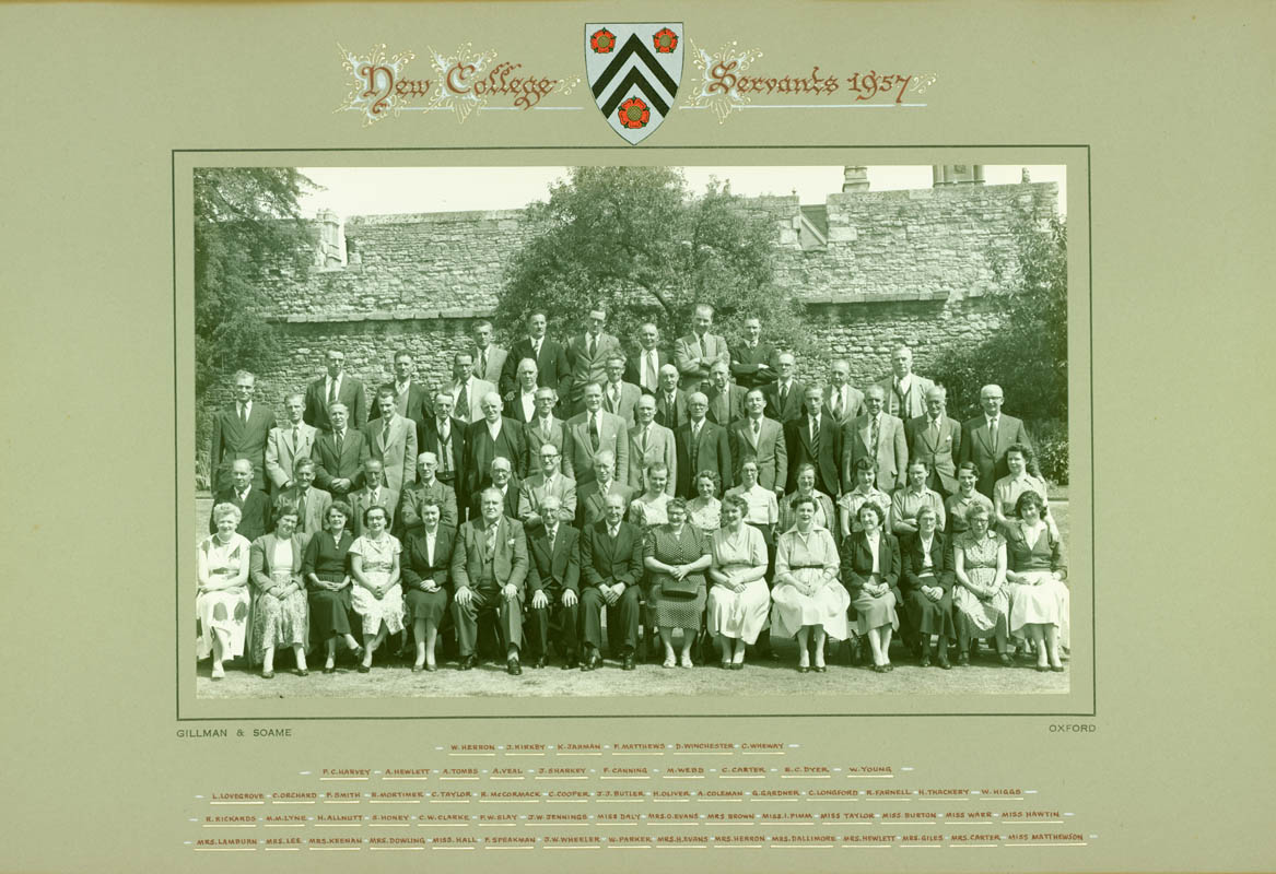 NCA DB/11, Photograph of New College servants, in front of Oxford's medieval city wall in New College Gardens, c. 1957-58 (© Gillman & Soame)