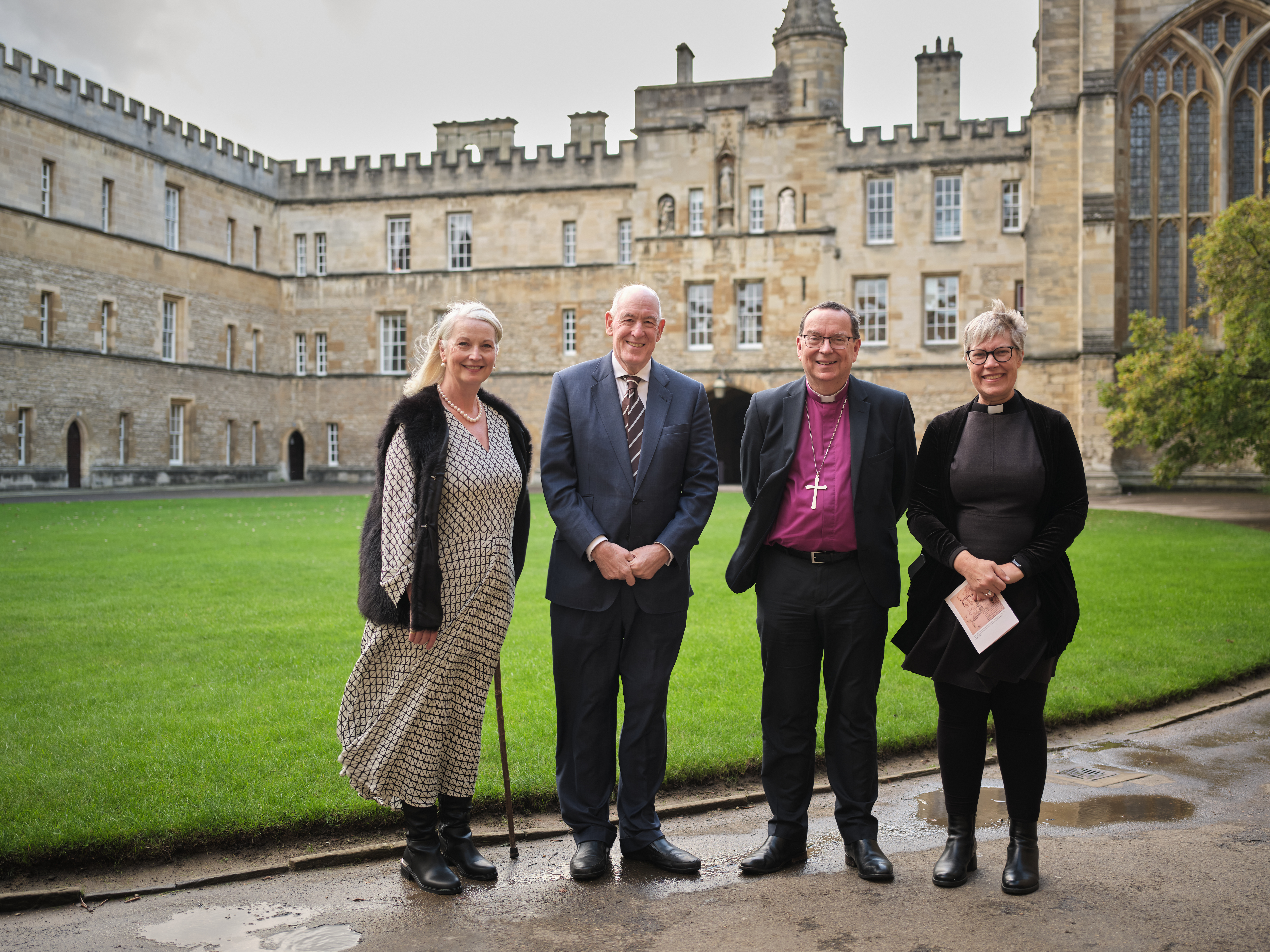 Miles Young pictured with Bishop and his wife, and Erica Longfellow