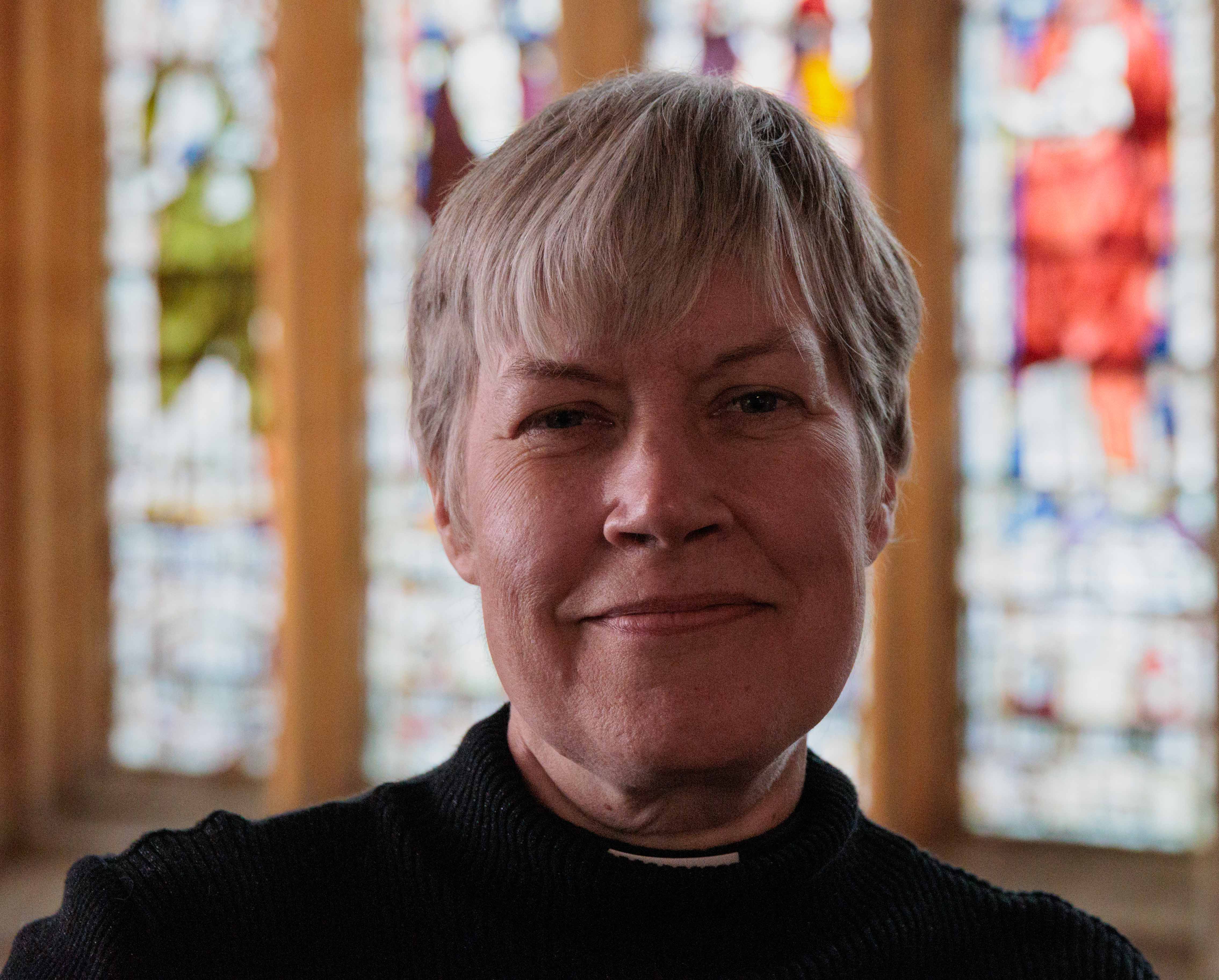 Headshot of the Dean of Divinity Rev'd Dr Erica Longfellow