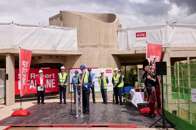 The Warden addresses the Topping Out