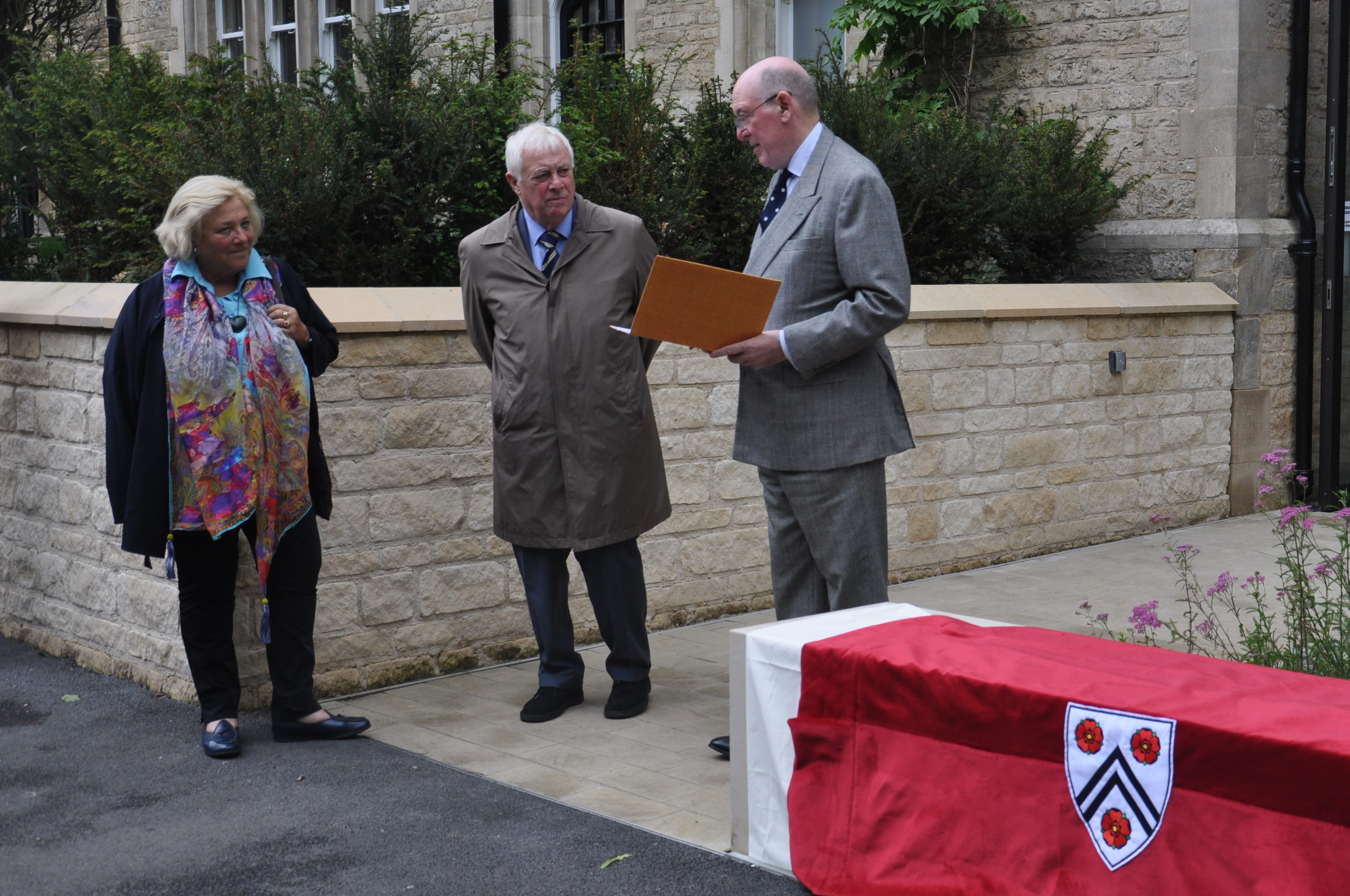 Dame Vivien Duffield, Lord Patten, and the Warden outside the Studios