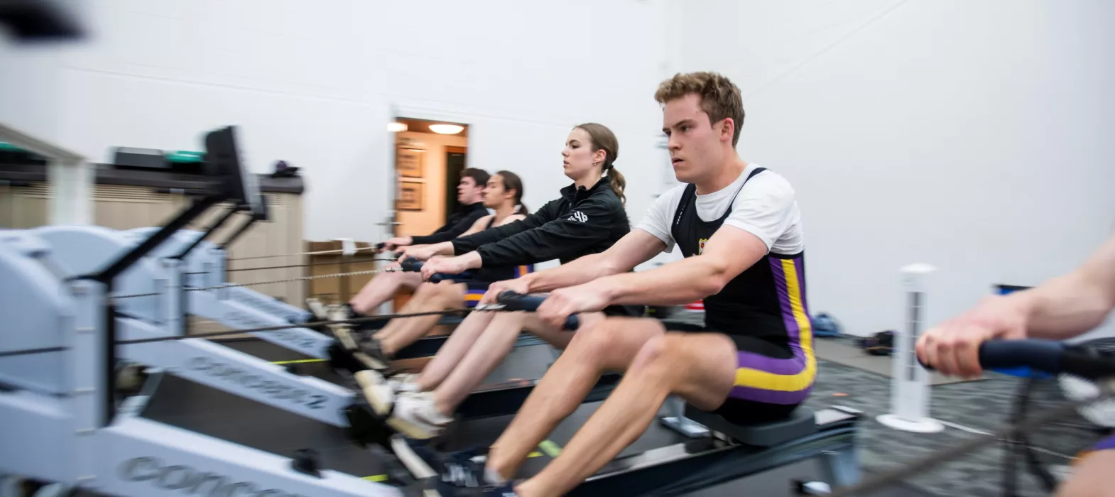 The rowing squad train in the erg room