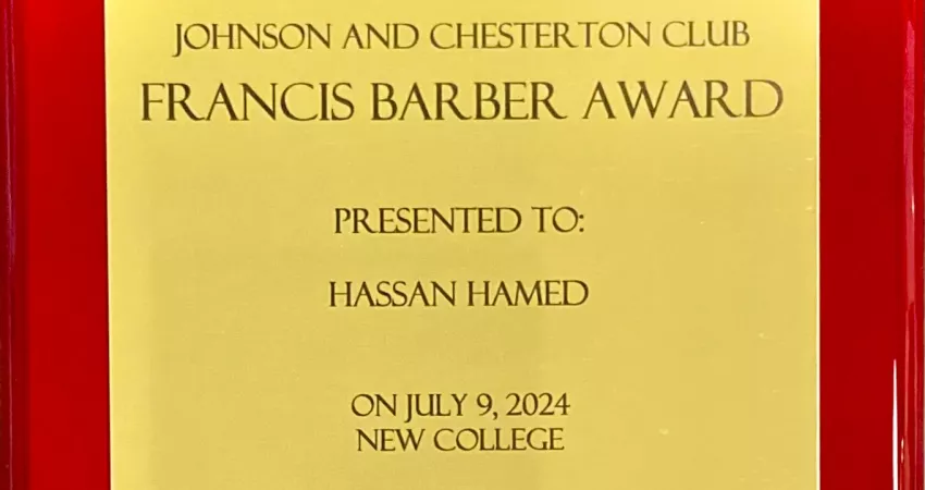 Hassan's award which states: "Johnson and Chesterton Club, Francis Barber Award, Presented to Hassan Hamed on July 9 2024 in New College"