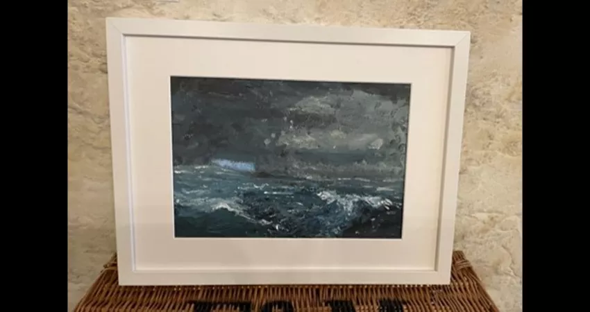 Framed painting of a stormy sea