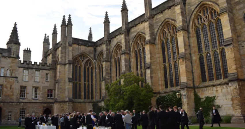Old Members gather in Front Quad for drinks before dinner