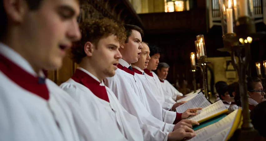 Close-up of choir members singing in Chapel