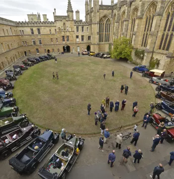 Bullnose Morris cars parked around New College Front Quad