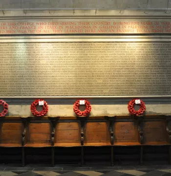 New College's WWI Memorial with wreaths laid underneath