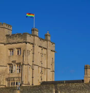 Rainbow flag flying over the Robinson Tower