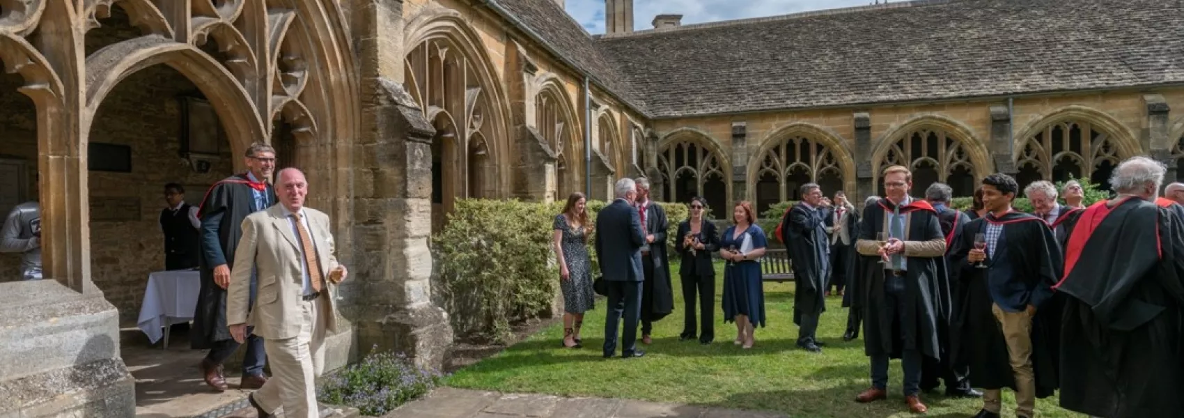 The Warden walks into the Cloisters